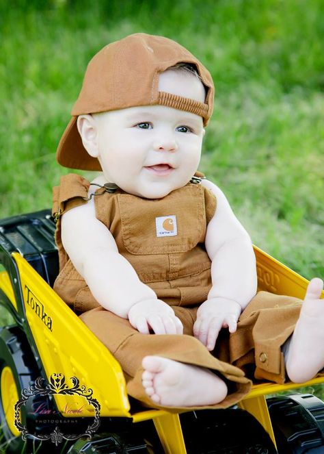 6 months @Lisa Phillips-Barton Nicole Photography .... Love the matching hat w/overalls and the tonka truck prop!!!! Note to self....