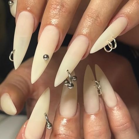 Le Labo 21 •Nail art & tooth gems •Paris on Instagram: "🦴+🪛=⛓️🖤   @apresnailofficial long stilettos   #gelxnails #gelx #apresnails #mattenails #piercing #longnails #stilettosnails #halloween #realistic #nailart" Pierced Acrylic Nails, Nail With Piercing, Pierced Nail Designs, Piercing Nail Art, Piercing Nails Art Designs, Pierced Nails Acrylic, Nail Piercing Acrylic, Nails With Piercing, Nails With Chains