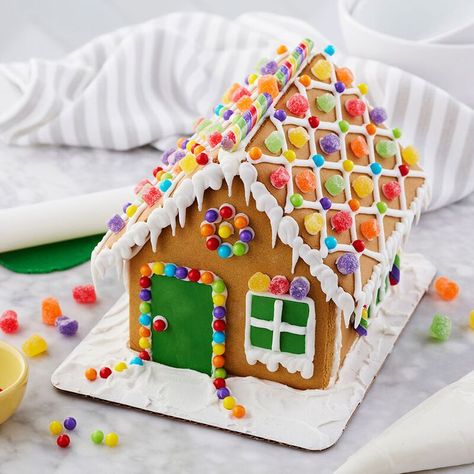 Christmas Activities | Holiday Fun | Gingerbread House No holiday is complete without building a gingerbread house with those you love dear! This kit provides everything you need to create a one of a kind masterpiece! Get yours today! #ad #christmas #fun #holiday #gingerbreadhouse #christmascheer #christmasspirit #holidayfun #winter #winteractivity #activity #kids #rainbow Village Gingerbread House, Easy Gingerbread House, Homemade Gingerbread House, Mini Village, Gingerbread House Decorating, Gingerbread House Candy, Mini Gingerbread House, Gum Drop, Gingerbread House Christmas