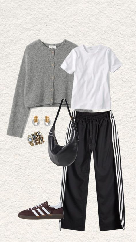 Track pants outfit inspo. Fall and winter outfit. Cold weather style. Street style. Mixed metal jewelry. Red adidas shoes. Sporty style inspo. Women’s fashion Adidas Track Pants Outfit Winter, Adidas Pants Outfit Winter, Black Athletic Skirt Outfit, Track Pants Outfit Casual, Adidas Track Pants Outfit Woman, Winter Sporty Outfits, Winter Outfit Cold Weather, Adidas Track Pants Outfit, Winter Outfit Cold