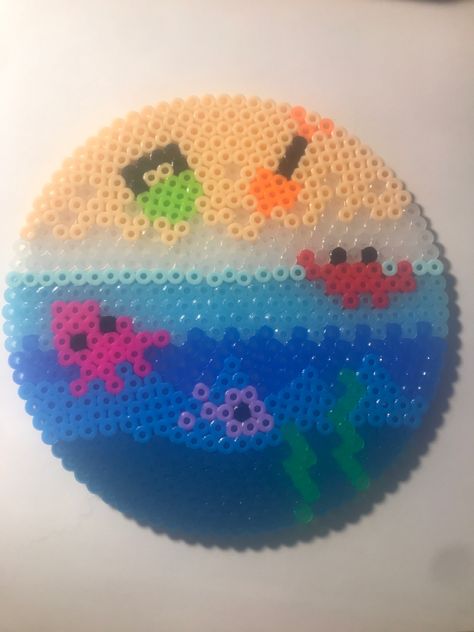 Sand, shovel, bucket, ocean, water, crab, octopus, fish, and seaweed 💙 Perler Beads Octopus, Ocean Perler Beads, Ironing Beads, Hamma Beads Ideas, Perler Ideas, Easy Perler Beads Ideas, Hamma Beads, Beads Ideas, Pixel Art Characters