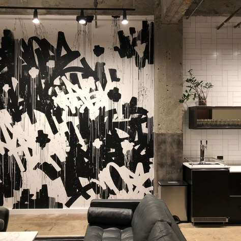 A black and white abstract graffiti tag mural in a production offices in New York City.  Bring exterior street art vibes into a corporate office workplace environment. Keep the dynamic and edgy aesthetic of the artwork while providing a clean appearance.  Contact us to commission a custom high end mural  for your office. Interior Mural Wall, Mural Street Art, Pattern Mural, Creative Mural, Office Mural, Abstract Graffiti, Office Workplace, Wall White, Craftsman Exterior