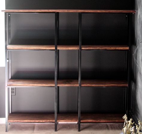 Bubby. Cheap metal shelves turned into high-end bookcase. Ikea Hack Bookcase, Bookshelf Ikea, Ikea Industrial, Ikea Kitchen Storage, Regal Industrial, Billy Ikea, Industrial Bookshelf, Industrial Bookcases, Metal Bookshelf