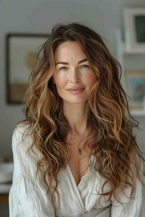 The Best Long Haircuts of 2024 Elegant Beach Waves Hair, Layered Beach Waves, Caramel Streaks, Beachy Wavy Hair, Beach Waves Hair, Best Long Haircuts, Wavy Beach Hair, Guest Hairstyles, Balayage Blond