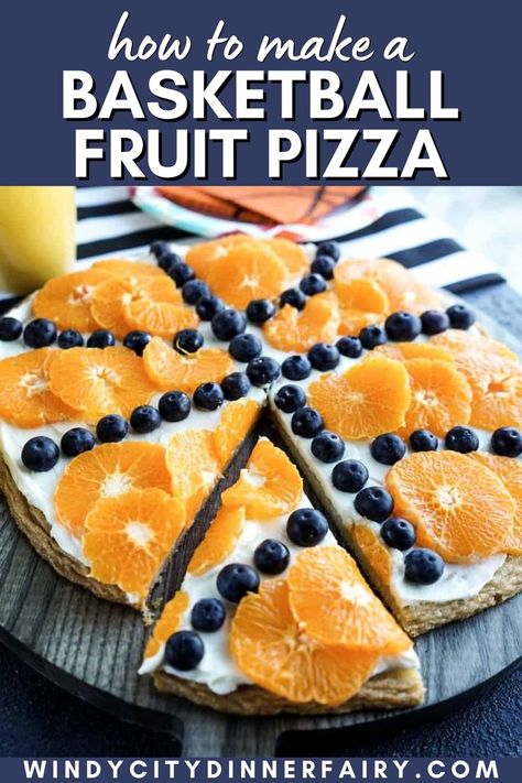 Calling all team moms! This easy-to-make basketball fruit pizza recipe was made with store-bought sugar cookie dough!! Let’s be honest, you’re not going to want to spend all morning in the kitchen when guests are coming over. So even the Dinner Fairy is allowed to take shortcuts. Save this easy dessert recipe for your basketball player's birthday, Father's Day, or Team Parties! #gamedayrecipes #basketballfood #teammomsnacks #cookiecake Cream Cheese Fruit Pizza, Basketball Food, Fairy Recipes, Fruit Pizza Crust, Fluffy Cream Cheese Frosting, Team Dinner, Team Snacks, Sugar Cookie Crust, Fruit Pizza Recipe