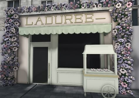 Cafe Exterior Design Bloxburg, Bloxburg Bakery Exterior, Bloxburg Town Entrance Ideas, Bloxburg Antique Shop, Bloxburg Eiffel Tower, Bloxburg Cafe Inspo Exterior, Coquette Cafe Bloxburg, Flower Store Bloxburg, Town In Bloxburg