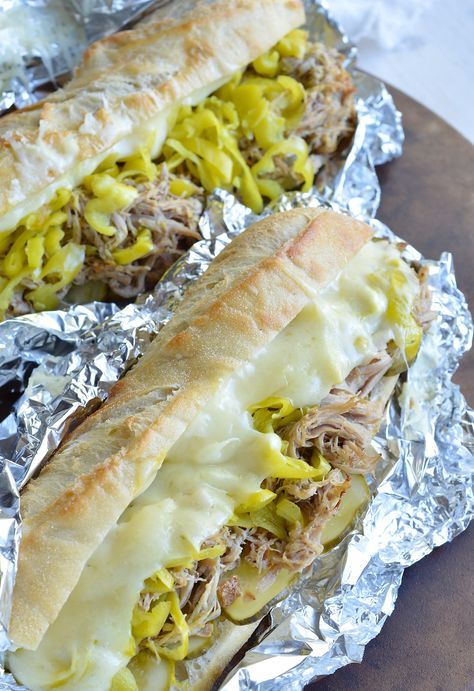 If you are tired of the same old barbecue pork sandwiches give these Slow Cooker… Pulled Pork Melt Sandwich, Pulled Pork Hoagies, Pork Roast Sandwiches Slow Cooker, Crockpot Cuban Sandwich, Pulled Pork Cuban Sandwich, Rolls For Pulled Pork Sandwiches, Italian Pork Sandwich Recipes, Pulled Ham Sandwiches, Roasted Pork Sandwiches