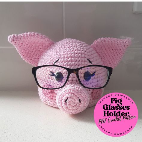 Pig Glasses Holder - PDF Crochet Pattern This is a pattern only - not the finished item itself. However, I do sell the finished glasses holder on a separate listing.  Available in English only Using medium worsted yarn 10 ply yarn and a 3 mm hook, the glasses holder measures approx. 13cm (5 inches) tall. This pattern is written in American crochet terminology. PDF pattern is automatically downloadable once payment is processed. I don't accept returns, exchanges or cancellations. But please conta Glasses Holder Crochet Free Pattern, Crochet Eyeglass Holder Free Pattern, Crochet Eyeglass Holder, Crochet Glasses Holder, Doorstop Pattern Free, Doorstop Pattern, Crochet Terminology, Disney Crochet Patterns, American Crochet