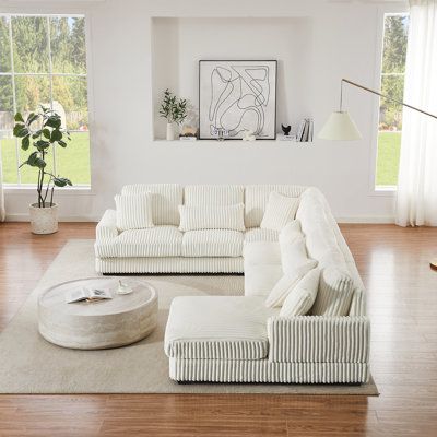 SummaryThis oversized U-shaped sofa is expertly designed to seamlessly blend comfort and style, creating a cozy retreat in your living room. Made from carefully selected materials, including thick foam and plush fabric, it is enveloped in luxuriously smooth corduroy upholstery. The elegantly curved armrests not only add a touch of sophistication but also provide the perfect balance of support and comfort. Enjoy the added convenience of removable throw pillows, making cleaning effortless. This ch Floating Couch In Living Room, Oversized Sectional, Oversized Sectional Sofa, Apt Decor, Reception Sofa, Shaped Sofa, U Shaped Sofa, Modern Couch, Modular Sectional Sofa