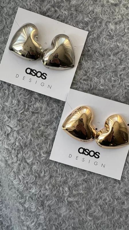 I heart them both 🩶💛 Puffy heart earrings | Asos hearts | Heart aesthetic | Silver heart earrings | Gold earrings | Valentine’s Day gift ideas | Valentine’s outfits   #LTKGiftGuide #LTKstyletip #LTKSeasonal Golden Heart Earrings, Heart Aesthetic, Chunky Gold Necklaces, Silver Heart Earrings, Golden Heart, Beads Jewellery, Closet Organizer, Chanel Earrings, Classy Jewelry