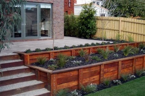 If your favorite outdoor space is your deck, we give you over 30 inspiring Deck Railing Ideas to show how you can spruce it up, from DIY to store bought. Wooden Retaining Wall, Spa Landscaping, Wood Retaining Wall, Sloped Yard, Sloped Backyard, Outdoor Stuff, Swim Spa, Diy Deck, Retaining Walls