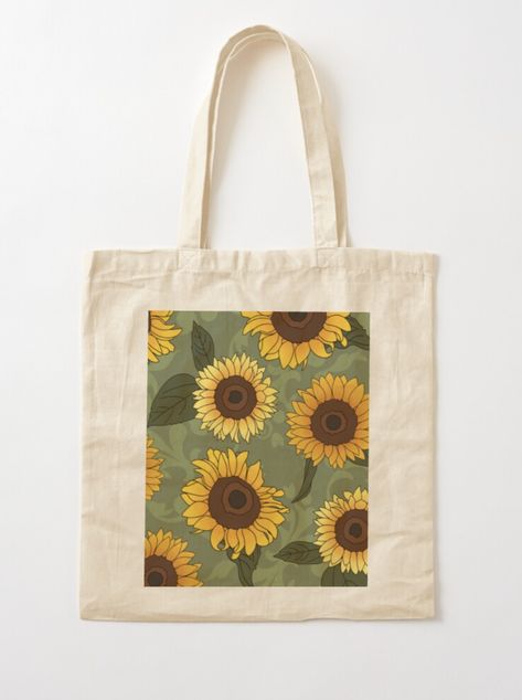 A field of pretty sleepy yellow sunflowers to brighten up your day! Compact, easy to carry shopping bag with digital print on one side Reusable, environmentally friendly, and other good things Lightweight 4.2 oz (145g) 100% cotton fabric Cotton strap is 21 inch (53cm) long and 1 inch (2.5cm) wide Hand wash in cold water Tote Bag Painting Ideas Flowers, Painted Totes, Hand Bags Ideas, Sunflower Tote Bag, Handpainted Tote, Diy Tote Bag Design, Sunflower Bag, Handpainted Tote Bags, Yellow Tote Bag