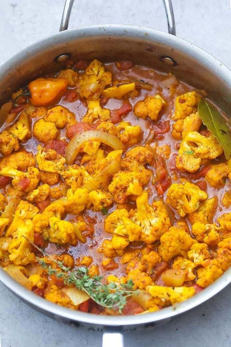 Here is a vegan Caribbean cauliflower curry you’ll be proud to serve your family and/or guests. It’s simple and easy enough to make for a weeknight meal but flavorful enough for special occasions. #vegan #plantbased #caribbeanfood #curry #cauliflower #ketodiet #sidedish #mainentree #dinner #foodfidelity Protein Snacks Healthy, Snacks High Protein, Kids Healthy Snacks, Creamy Coconut Sauce, Thai Food Recipes, Curry Cauliflower, How To Make Cauliflower, Jamaican Dishes, 100 Calorie Snacks