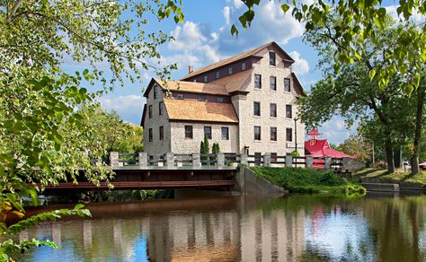 Limestone buildings create a scenic backdrop in Cedarburg. Cedarburg Wisconsin, Starved Rock State Park, Washington Houses, Illinois Travel, Indiana Dunes, Midwest Living, Tuscan Inspired, Chicago Photos, Yellow Houses