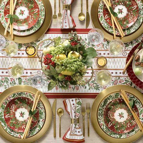 A Christmas table with fruit centerpiece Colored Dishes, Etched Tumblers, Rings Stand, Christmas Dining Table Decor, Holiday Dinnerware, Christmas Dining Table, Appetizer Plates Set, Table Setting Inspiration, Floral Napkins