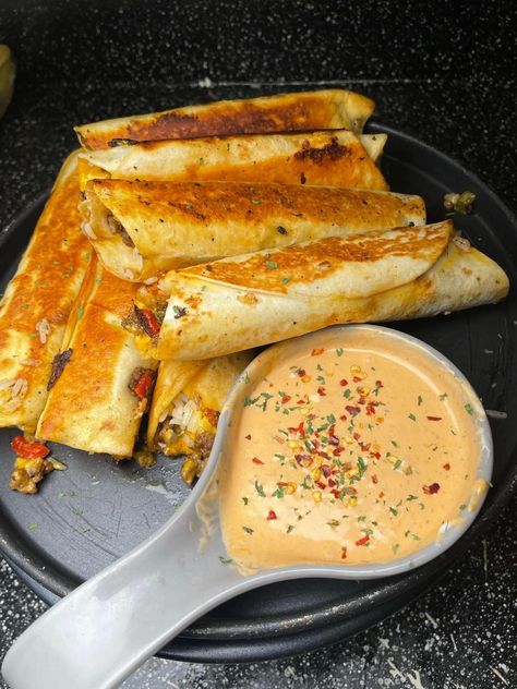 Cheesy Beefy Roll-Ups Cheesy Beefy Rollups, Cheesy Beef Roll Ups, Ground Beef Blackstone, Ground Beef Roll Ups, Cheap Blackstone Meals, Cheesy Roll Ups, Mexican Roll Ups, Easy Cooking Ideas, Beef Roll Ups