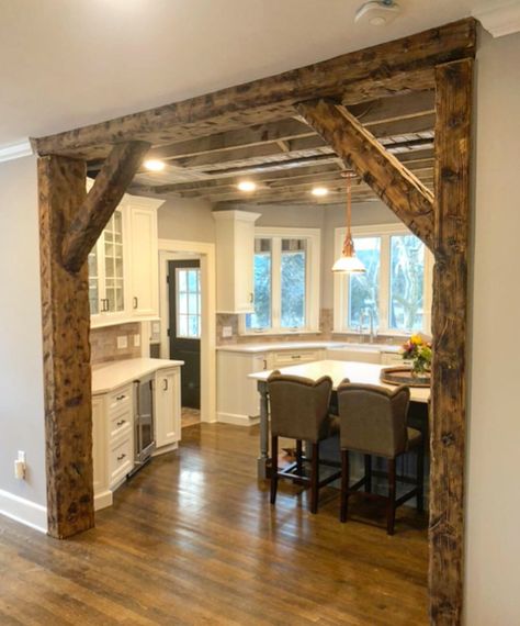 Custom reclaimed wood beam entryway 12x6 solid pine beams #reclaimedwood #rusticdecor #famrhousedecor #rustic #farmhouse #industrial #industrialdecor #interiordesign #reclaimedwooddecor #beams #beamentryway #truss #woodtruss #woodworking #rustickitchen #farmhousekitchen Barnwood Beams Ceiling, Exposed Beam Doorway, Wood Beam Entryway, Wood Beam Doorway, Beam Entryway, Wood Archway, Barnwood Walls, Dark Floor Living Room, Rustic Trim