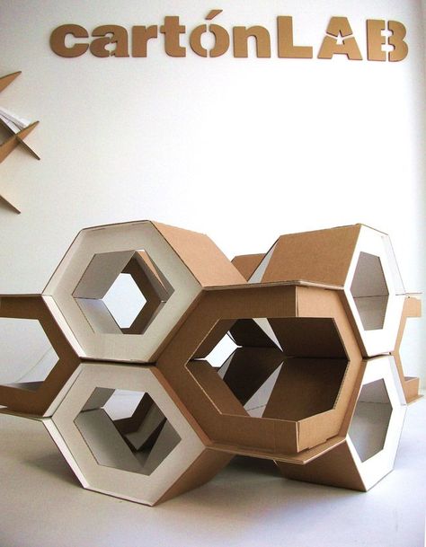 Modular geometric cardboard structure | cartonLAB Tokyo Bar, Cardboard Ideas, Cardboard Design, Dog Tree, Paper Furniture, Modular Structure, Cardboard Sculpture, Cardboard Art, Cardboard Paper