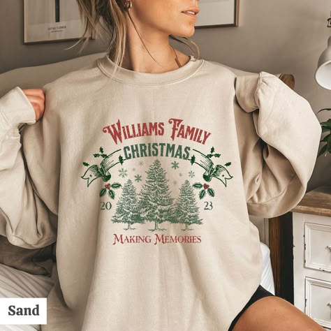 Custom Family name Christmas Sweatshirts for 2023. These crewnecks are personalized with your family name and are printed on on Gildan 18000 shirts. Will make for a great family Christmas photo op :) Happy holidays!  ✨ Free shipping!✨  Product color may vary slightly due to variation in photographic lighting and screens/monitors displaying colors differently. When ordering and choosing your size, please keep the unisex fit in mind. If you find your size is out of stock (these are well-loved!) consider sizing up for that oversized sweatshirt look Just lay out your favorite sweatshirt and measure its width and length to see how this one will compare. Caring for your sweatshirt:  Turn inside out, machine wash in cold water  with mild detergent on gentle and hang to dry. Thank you for choosing Family Christmas Sweatshirts, Outfit Ideas Shirt, Family Christmas Sweater, Family Christmas Sweaters, Shirt Outfit Ideas, Christmas Tree Hoodie, Shirt Design Ideas, Thanksgiving Sweatshirt, Etsy Ideas