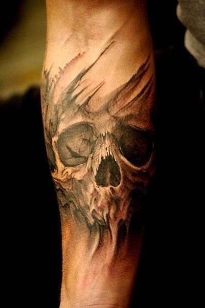 This forearm tattoo highlights a ghastly yet strikingly beautiful face of a skull. It seems to have a life of its own with long black veins above and below the intricate drawing this delicately inked picture is made up of. #tattoofriday #tattoos #tattooart #tattoodesign #tattooidea Skull Sleeve Tattoos, Skull Sleeve, Biker Tattoos, Sugar Skull Tattoos, Geniale Tattoos, Skull Tattoo Design, Celtic Tattoos, Badass Tattoos, A Skull