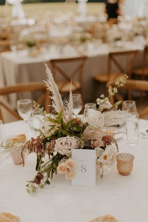 Floral centerpiece of muted blush tones and dried elements accented with blush mercury glass candles were center focal for the round guest tables. Jenna Borst Photography / Kate Elizabeth Brides Boho Wedding Centerpieces With Candles, Round Boho Centerpiece, Wedding Floral Centerpieces Circle Table, Round Wedding Table Centrepiece, Round Table Wedding Centerpieces Boho, Boho Floral Centerpieces Wedding, Wedding Guest Centerpieces, Round Boho Table Wedding, Boho Round Wedding Table