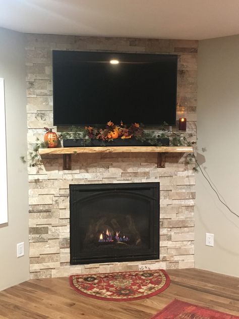 Gas Fireplace For Corner, Corner Fireplace Mantle Decor With Tv, Corner Fireplace In Basement, Corner Chimney Ideas, Build Corner Electric Fireplace, Corner Stone Fireplace With Tv, Corner Electric Fireplace Ideas With Tv Diy, Corner Fireplace Basement Ideas, Stone Wall Fireplace With Tv Corner