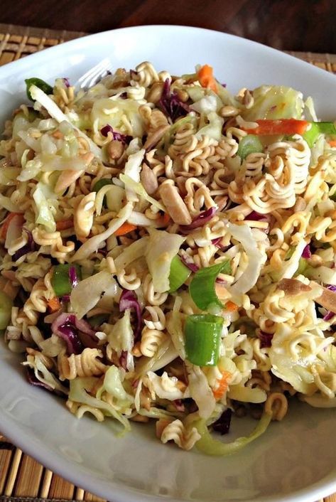 Looking for salad recipes? Try making this ramen salad. Use roman noodles, cabbage, almonds, and sunflower seeds to make this quick and easy ramen salad for a side dish, side salad, lunch, or dinner. #saladideas #saladrecipes #salads #vegetables #sidedishrecipes #sides #dinnersidedish #sidedishes #sidedishideas Crunchy Noodle Salad, Asian Ramen Noodle Salad, Asian Ramen Salad, Easy Potluck Recipes, Ramen Noodle Salad, Ramen Salad, Easy Potluck, Chicken Chopped Salad, Recipe 30