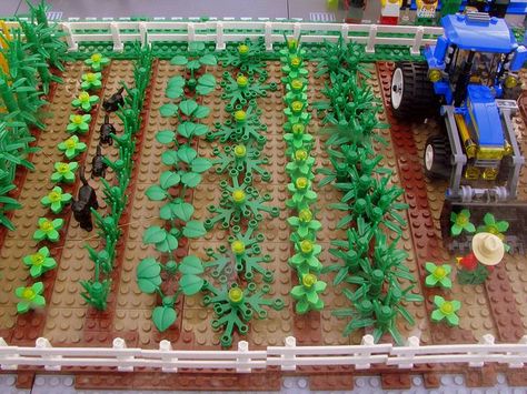 LEGO garden idea - great use of greenery to make so many different plants. Love the tractor, too Lego Garden, Lego Farm, Lego Village, Lego Buildings, Lego Boards, Lego Diy, Lego Activities, Lego Lovers, Lego Modular