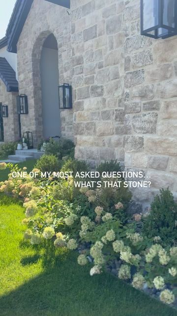 Kelly Griffiths on Instagram: "Save for later: I get asked all the time about my stone. We wanted stone that reminded us of the cobblestone homes in the UK. This stone was the closest match from Creative Minds in the color Timberwolf. We used the lightest grout/mortar that our stone installer could make.   #home #stone #stonehome #stoneexterior #whitehouse #homeinspiration #homeinspo #designbuild #englishhome #dreamhome #exteriorlighting #newbuild #customhome #customhomes @creativemines #arch #facade #mydomaine #interiordesignideas #hydrangea" Exterior Stone Ideas, Limestone House Exterior, Front Porch Stone, Limestone House, Arch Facade, Custom Home Ideas, French Ideas, Exterior Stone, English House