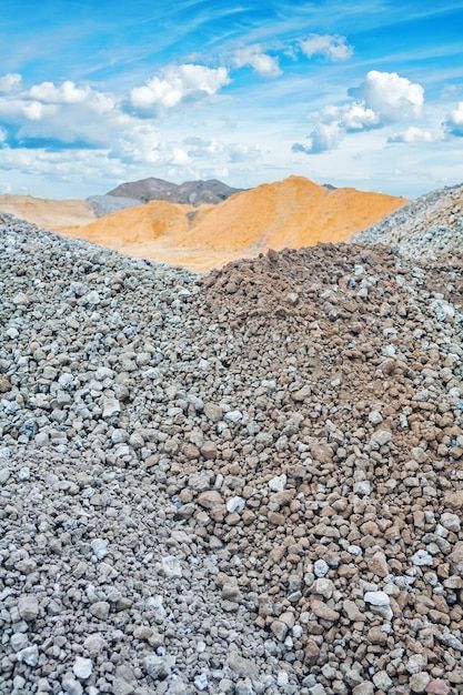 Piles of construction sand and gravel on... | Premium Photo #Freepik #photo #gravel #construction-materials #building-materials #pebbles Sand And Gravel, Material Textures, Construction Materials, Building Materials, Vector Photo, Premium Photo, The Sky, Stock Photos, Photo And Video