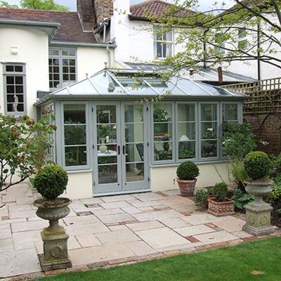 Wooden Edwardian conservatory in Sage green Green Conservatory, Edwardian Conservatory, Small Conservatory, Mudroom Addition, Modern Conservatory, Orangery Extension, Glass Porch, Georgian Doors, Conservatory Design