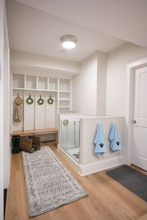 Minnetonka Beach Remodel | Mudroom + Dog Wash Mudroom Pet Wash, Dog Wash In Mudroom, Laundry Room For Dogs, Dog Washroom Ideas, Dog Mud Room Ideas Farmhouse, Mud Room Ideas With Dog Wash, Mudroom With Dog Bath, Farmhouse Laundry Room With Dog Wash, Dog Bath In Mudroom