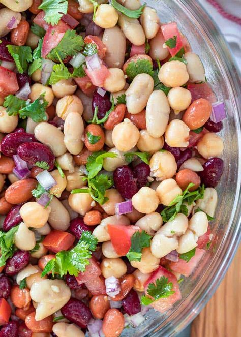 This 4 bean salad has tender red, pinto and cannellini beans, plus protein-rich chickpeas, and a spicy vinaigrette. The perfect cold salad for a summer bbq, or add meat to make it a main dish! Red Bean Salad, Salad Recipes Pasta, Recipes Pasta Salad, Recipes Tuna, Recipes With Cool Whip, Salad Appetizer Cups, Layered Salad Recipes, Bean Salad Recipe, Noodle Salad Recipes