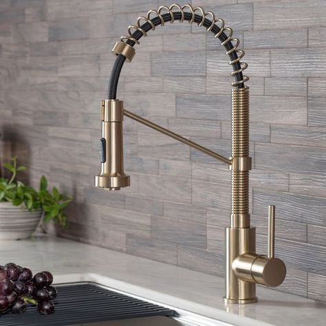 With universal appeal and professional functionality optimized for residential use, Bolden pull down kitchen faucet creates a captivating industrial look with a high-arc open coil spout, and offers the advantage of a compact 18-inch height that fits… Gold Kitchen Faucet, Commercial Kitchen Faucet, Portable Dishwasher, Brass Kitchen Faucet, Single Handle Kitchen Faucet, Brass Kitchen, Gold Kitchen, Champagne Bronze, Kitchen Sink Faucets