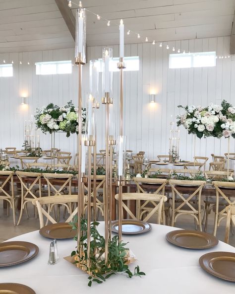 We love these modern gold candelabras for a bit of height at this Texas greenery wedding at The Grand Ivory. Modern Candelabra Centerpiece, Wedding Candelabra, Candlebra Centerpiece, Gold Stand Centerpiece Wedding, Tall Candle Centerpieces Wedding, Gold Candleabras Centerpiece Wedding, Gold Candleabra Wedding, Gold Candelabra Centerpiece Wedding, Candlebra Centerpiece Gold