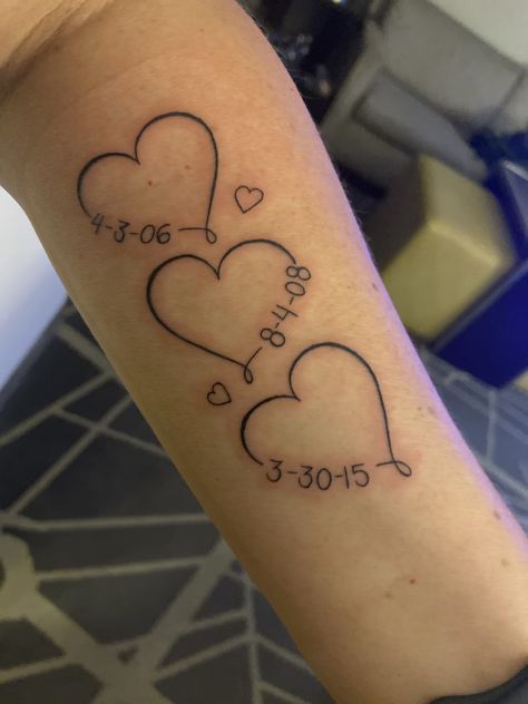 Heart birthday tattoo Hearts With Dates Tattoo, Mom Birthday Tattoo, Date Heart Tattoo, Heart Tattoo With Birthdates, Heart With Year Tattoo, Hearts With Birthday Tattoo, Heart Birthdate Tattoo, Childs Birthday Tattoo, Name And Birthday Tattoo