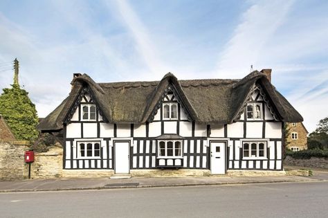 The Malt House, in Evesham, Worcestershire, is a two-hour train ride from London. The property is a quintessential old English timbered cottage dating from 1502. It is listed with Fine & Country for offers over $750,000. Tudor Houses, English Tudor Homes, Tudor Architecture, Tudor Homes, Tudor Period, Tudor Cottage, Timber Frame House, Storybook Homes, Tudor Era