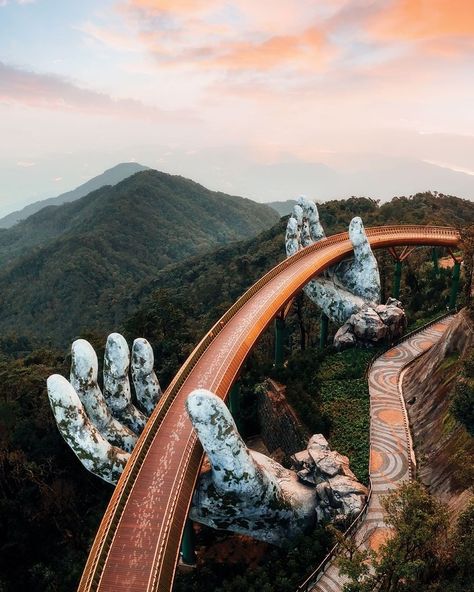 BEAUTIFUL DESTINATIONS’s Instagram profile post: “The Golden Bridge is a 150-meter-long pedestrian bridge near Da Nang, Vietnam. 🤩Offering majestic panoramic views of the surrounding…” Buddhist Pagoda, Da Nang Vietnam, Golden Bridge, Vietnam Voyage, Visit Vietnam, Travel Music, Pedestrian Bridge, Famous Landmarks, Canon Photography