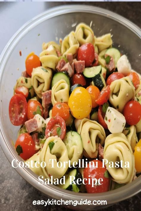 Last Updated on October 6, 2023 Costco’s tortellini pasta salad is a delightful medley of flavors and textures that has become a fan favorite for its delicious taste and easy preparation. This recipe takes the classic Italian pasta salad to new heights, featuring cheese-filled tortellini as the star of the dish.  The tortellini, with its ... <a title="Costco Tortellini Pasta Salad Recipe – Easy Kitchen Guide" class="read-more" href="https://easykitchenguide.com/costco-tortell... Costco Tortellini Pasta Salad, Tortellini Pasta Salad Recipes, Tortellini Pasta Salad, Tri Color Pasta, Costco Meals, Pasta Salad With Tortellini, Easy Pasta Salad Recipe, Tortellini Pasta, Tortellini Salad