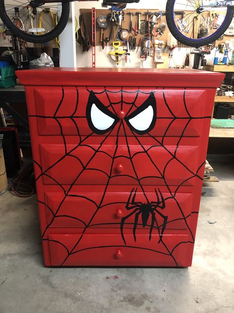 Spiderman And Batman Bedroom, Spiderman Nightstand, Spiderman Dresser Diy, Disney Themed Furniture, Spider Man Dresser Diy, Spiderman Drawer, Spiderman House Decor, Spidey Room Ideas, Spiderman Theme Bedroom