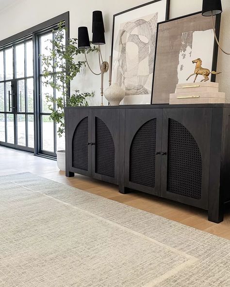 Black arch sideboard and new neutral rug in Mist/Ivory both on sale! Rug color is a very subtle blue, more of a cool toned neutral! Two Living Room Ideas, Extra Long Sideboard, Sideboard Styling, Modern And Vintage Decor, Cane Sideboard, Credenza Decor, Moody Modern, Sideboard Styles, Black Arch