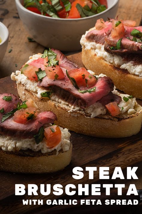 Whether you're looking for a show stopping appetizer or a creative way to use leftover steak, this Strip Steak Bruschetta recipe has you covered. 2 boneless Strip Steaks 5 cloves garlic, smashed 2 tablespoons vegetable oil 2 tablespoons olive oil 1 loaf ciabatta bread (11 to 14 ounces) 3/4 cup feta cheese crumbles 1/2 teaspoon kosher salt 1/4 teaspoon coarse grind black pepper 1 cup diced Roma tomatoes, seeded, ribs removed 1/3 cup thinly sliced fresh basil leaves Brushetta Recipe Steak, Steak Bruschetta Appetizers, Steak On Bread Appetizer, Holiday Steak Bruschetta, Bruchetta Appetizers Steak, Beef Bruschetta, Garlic Bread Bruschetta Recipe, Steak Bruschetta, Bruchetta Appetizers Balsamic Vinegar