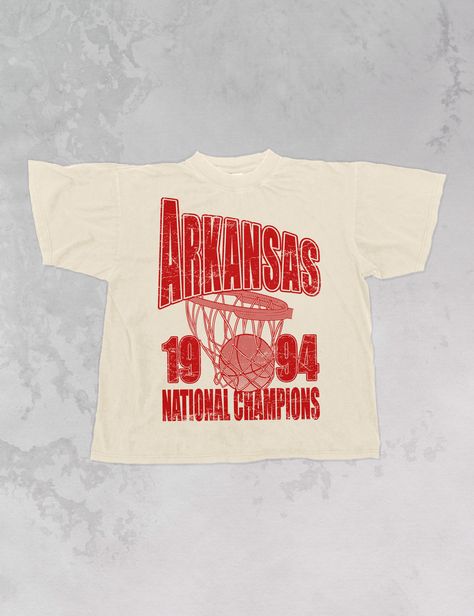 Show support for your favorite team Game Day in our Arkansas Basketball National Champions oversized vintage 90's basketball inspired tshirt!- Features the word "Arkansas" across the top in oversized lettering with a basketball hoop underneath and "1994 National Champions" underneath it all in a red ink- Screen print transfer that is heat pressed onto each tshirt- Printed on a vintage feel, garment dyed t-shirt that gets softer with each wash.- Oversized fit- Sizing translation: XS/S = L , S/M = XL , L/XL = 2XL , 2XL/3XL = 3XL- 100% Cotton**due to screens & filters color may vary from pictures** Band T Shirts Design, Vintage Christian Tshirt, Vintage Basketball Shirts, Vintage College Tshirts, Vintage Sports Shirt Design, Event Tshirt Design Shirt Ideas, Vintage Merch Design, Vintage Tee Shirt Designs, Athletic Shirt Design