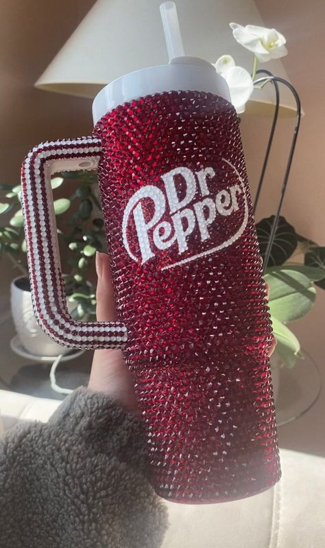 30oz authentic Stanley covered in premium glass rhinestones CARE INSTRUCTIONS: -Do not soak -Hand wash only with warm soapy water -Not microwave or dishwasher safe Enjoy your beautiful new tumbler! Bedazzle Stanley Cup, Dr Pepper Can Gunner, Cute Bedazzled Things, Rare Stanley Cup, Dr Pepper Stanley, Cute Cup Designs Ideas, Dr Pepper Gifts, Bedazzled Stanley Cup, Rhinestone Stanley Cup