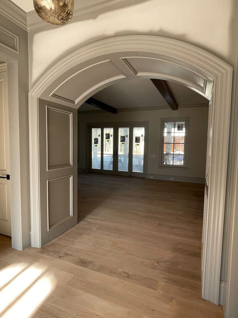 arch barrel opening foyer Barrel Arch Entry, Wainscoting Around Arches, Arched Cased Opening, Arched Opening Between Rooms, Deep Doorway, Arched Doorway Trim, Wide Archway, Arched Passageway, Colonial Stairs