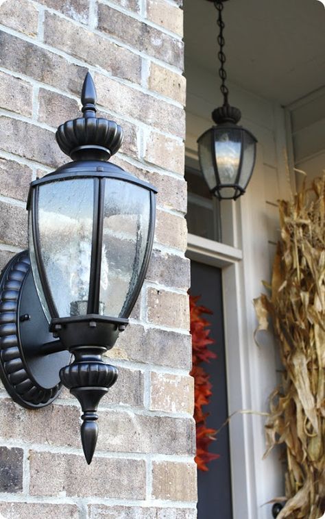 YES you can spray paint outdoor lights! Ours still look great seven years later -- check out this DIY project that will save you a ton of money! Spray Painting Door Knobs, Spray Painting Light Fixtures, Painting Light Fixtures, Thrifty Decor Chick, Thrifty Diy, Coach Lights, Brass Light Fixture, Brass Door Knobs, Paint Brass