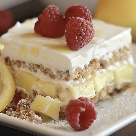 No-Bake Lemon Eclair Cake Step - Nine Recipes No-bake Lemon Eclair Cake Recipe, Lemon Eclair Cake No Bake, No Bake Lemon Eclair Cake, Lasagna Ideas, Lemon Eclair, Jumbo Shell Recipes, Egg Free Dessert, Shell Recipes, Eclairs Dessert