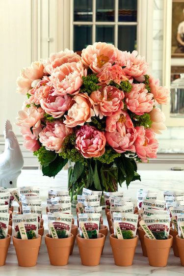 Flowers always look prettiest when they look like they were gathered from the yard, simple and loose, and seasonal. I love small clay pots of blooming flowers, geraniums, miniature roses, begonias or even herbs lined up on a beautifully-done table. I love that juxtaposition.   - HouseBeautiful.com Garden Party Favors, Garden Party Bridal Shower, Cheap Wedding Centerpieces, Party Seating, Succulent Centerpieces, Garden Party Decorations, Wedding Favors Cheap, Garden Party Wedding, Wedding Party Favors