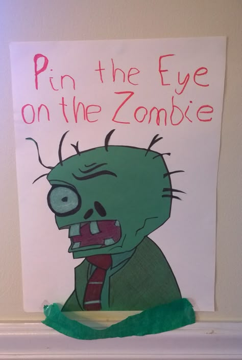 Pin the Eye on the Zombie, plants vs zombies party Plants Vs Zombies Party Games, Zombie Apocalypse Birthday Party, Plants Vs Zombies Birthday Party Games, Plants Vs Zombies Birthday Party Ideas, Zombie Birthday Party Ideas, Plant Vs Zombies Party Ideas, Zombie Party Ideas, Kids Zombie Party, Zombie Party Games