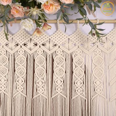 Create a unique space and decorate the wall with this macrame tapestry, adding a unique bohemian touch to your home. This macrame banner can be strung with a rope or easily fixed to a wooden pole. Bungalow Rose Color: Beige | Bungalow Rose Bohemian Bedroom Curtains, Lace Tapestries, Room Divider Curtains (77"L x 35"W) in Beige | Wayfair Macrame Banner, Room Divider Curtains, Tapestry Room, Room Divider Curtain, Macrame Tapestry, Wooden Poles, Macrame Curtain, Bedroom Curtains, Bohemian Bedroom